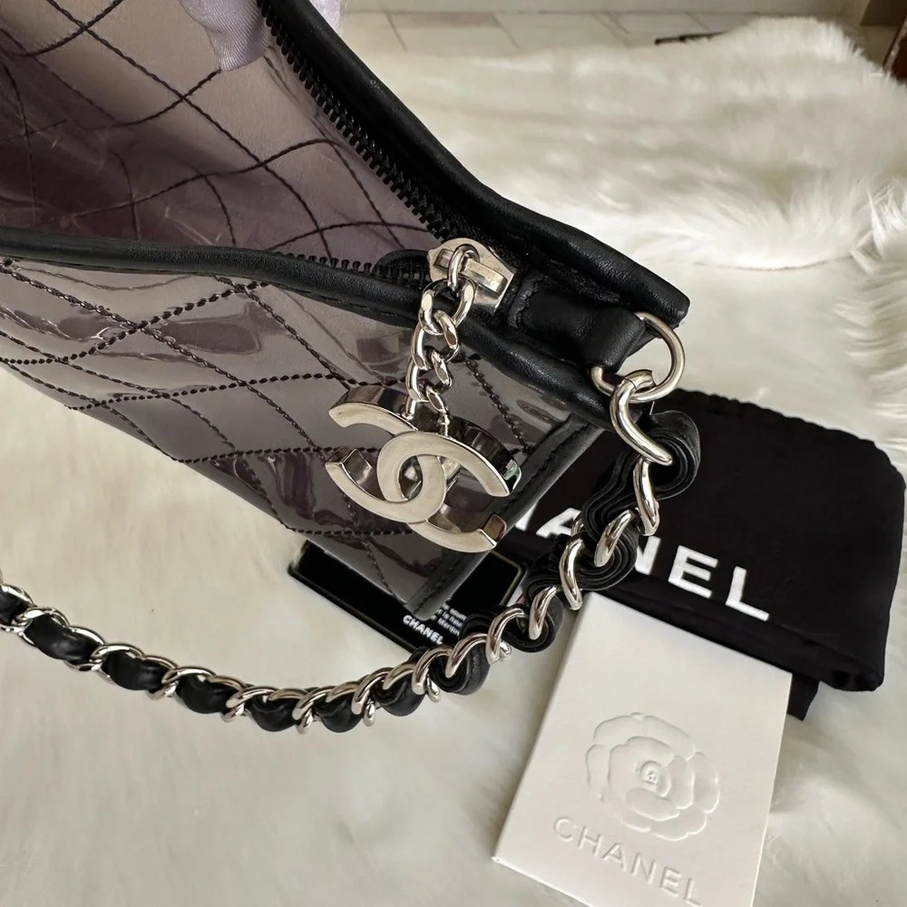 CHANEL Silver Quilted PVC Shoulder Bag with Black Trim